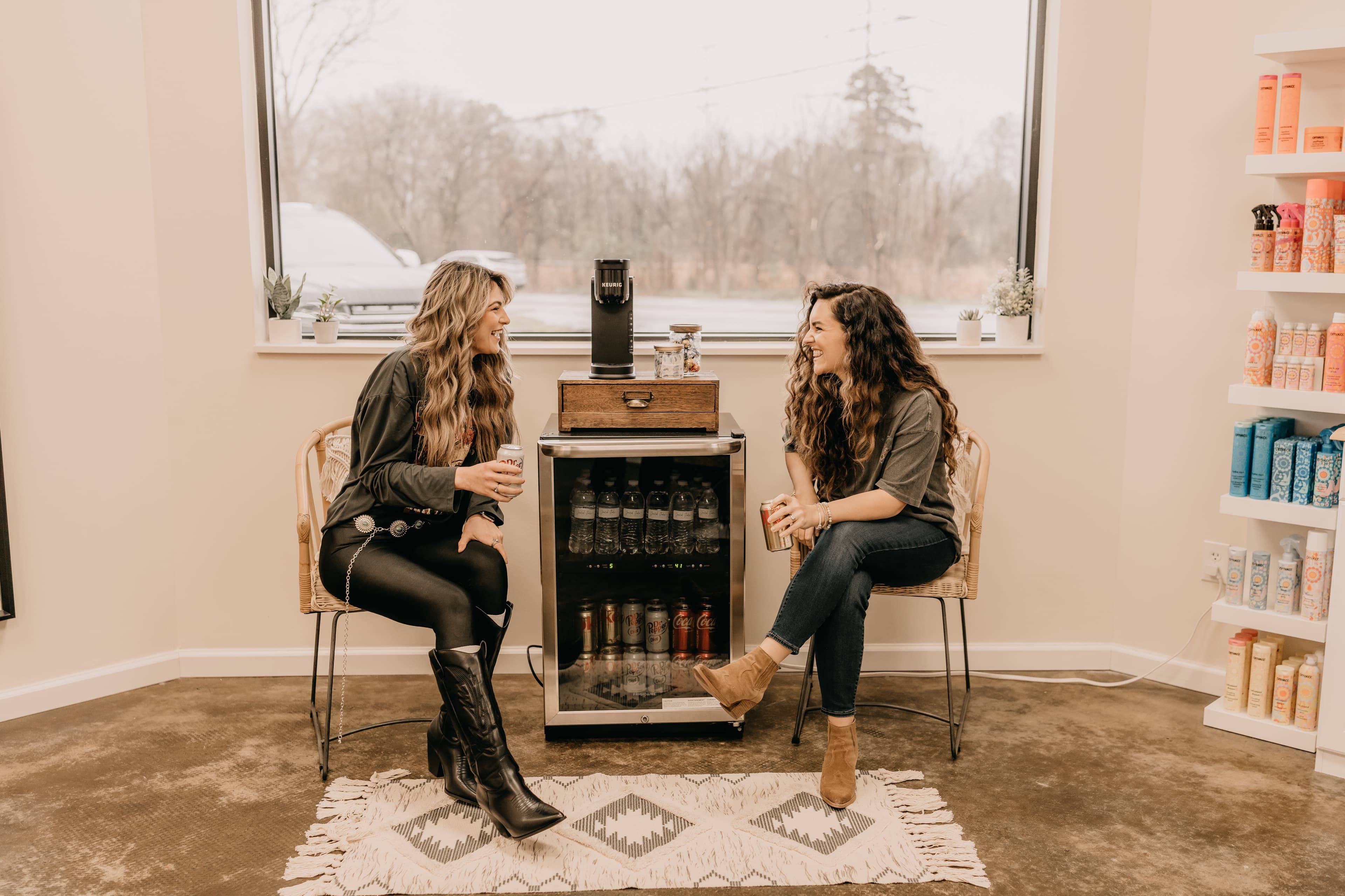 Two young ladies talking at Graced Studio